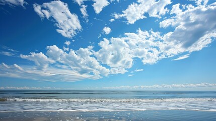 Obraz premium The sky at the beach, with its endless horizon, evokes feelings of peace and infinity, making us feel connected to the greater world.