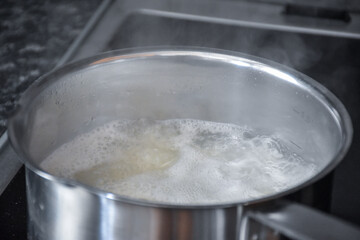 Cooking white rice in a saucepan
