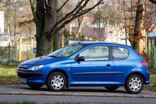 Blue French Peugeot 206 car parked on street