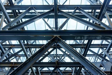 Abstract steel beams forming intricate frameworks, abstract industrial background, concept of construction
