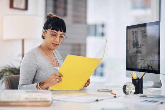 Office, computer and business woman with files for administration, human resources and paperwork. Corporate, receptionist and person with documents for secretary, planning and company folder review