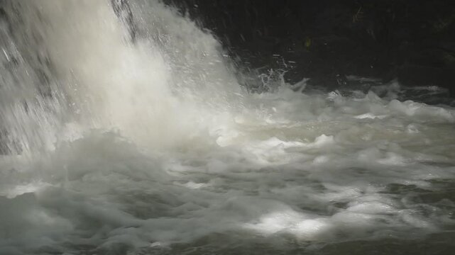 water falling on river pass rock and stone at north Chet Kod waterfall in Thailand 