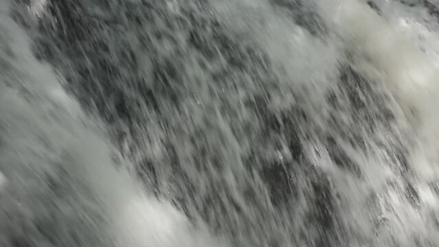 water falling on river pass rock and stone at north Chet Kod waterfall in Thailand 