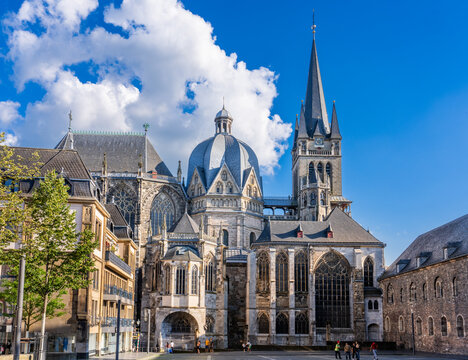 Aachen, Germany - June 23 2024 - Tourists visiting the Aachener Dom (Cathedral) seen from the Katschhof in the center of town