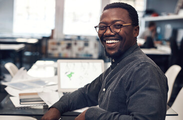 Black man, portrait smile and laptop by desk for startup, construction business and research in office. African architect, entrepreneur and computer for email, rendering software and property design