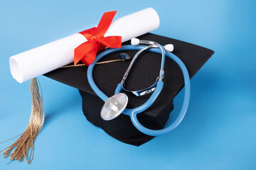 Medical education, graduation cap and doctor's stethoscope, bachelor in health studies graduating, school ceremony honoring medical graduates