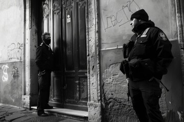 Fototapeta premium two people about to break the law, scene at shady neighborhood, crime rate, criminal activity in big cities, safety and security level