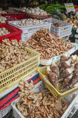 Hoi An, Vietnam - 5 Feb, 2024: Turmeric and ginger for sale at a market stall in Hoi An, Vietnam
