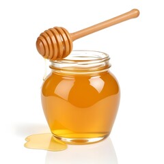 A glass jar filled with golden honey isolated on white