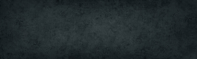 Black concrete wall. Dark old shabby rough cement panoramic distressed texture. Gloomy grunge...