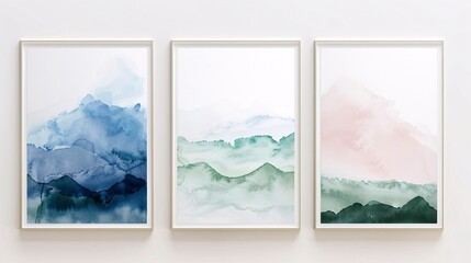 Three minimalistic abstract art posters with watercolor designs, arranged horizontally on a white wall. The posters highlight gentle washes of blue, green, and pink, blending seamlessly to form a