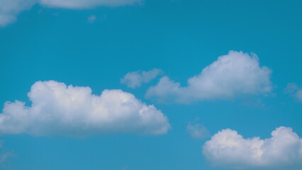 Blue Sky Background And White Clouds Soft Focus. Blue Sky Is Covered By White Clouds.