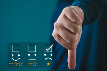 A hand showing a thumbs down and a rating form indicating poor satisfaction with a single star and...