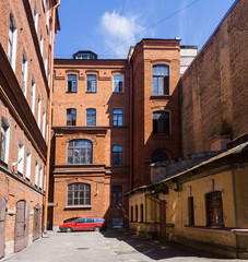 old residential buildings in the historical center of the city, view from the courtyards