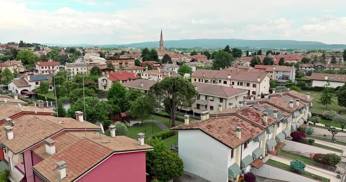 Cornuda, Italy Aerial Cityscape: Houses Architecture in Urban Setting in Mountainous Terrain. High quality 4k footage