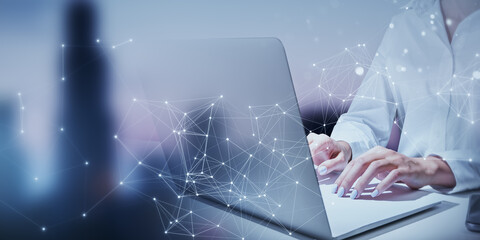 Person using a laptop with abstract digital network connections overlaid, with a blurred background, highlighting the concept of connectivity