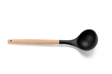 Black spoon with wooden handle. lies on a white background.