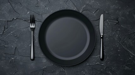 Elegant black plate with fork and knife on dark textured surface, ideal for website or menu mockup, detailed and high-quality