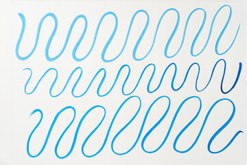 wavy blue lines on paper with micro perforations