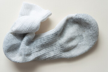 bottom of worn sock with stress point from regular use