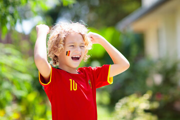 Belgium football fan. Belgian kids play soccer.