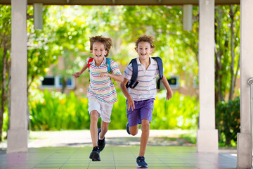 Child happy to be back to school.