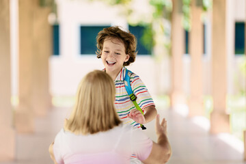 Child happy to be back to school.
