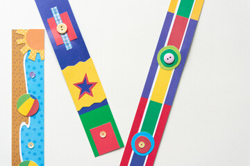 fun scrapbooking banners arranged on blank paper