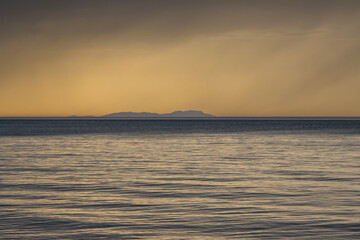 Obraz premium Calm sea and island Ereikousa, Greece