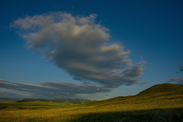 Russia. South Of Western Siberia. Republic Of Khakassia. Picturesque horizons of endless steppes along the highway between the villages of Shira and Uzhur.