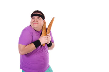Funny fat man on a diet with baguettes posing on a white background.