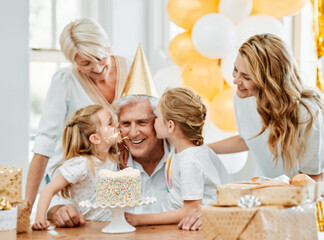Big family, birthday cake and celebration in home with kiss, sparkle and express gratitude. Happy people, grandmother and parents with children for grandfather party, growth and dessert on table