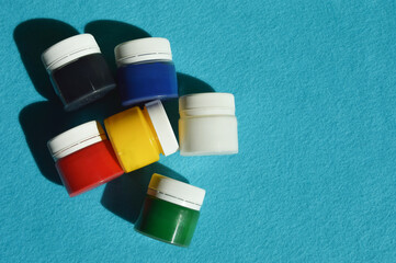 paints for drawing, gouache in jars, children's creativity, material for the artist. background for...