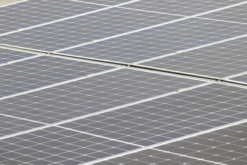 Photovoltaic panels on the roof.  View of solar panels in a house on the roof.