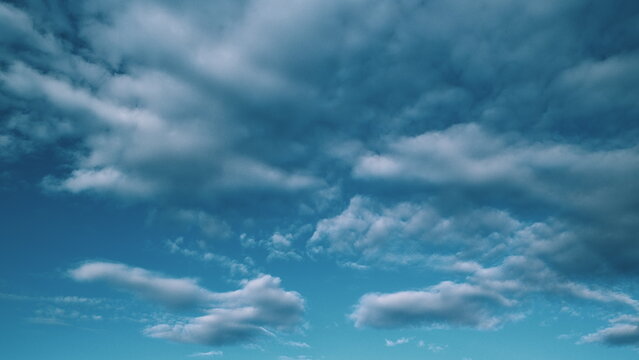 Tropical summer sunlight. White and blue cumulus and cirrocumulus on different layers clouds background. Tropical summer morning bright sunlight.