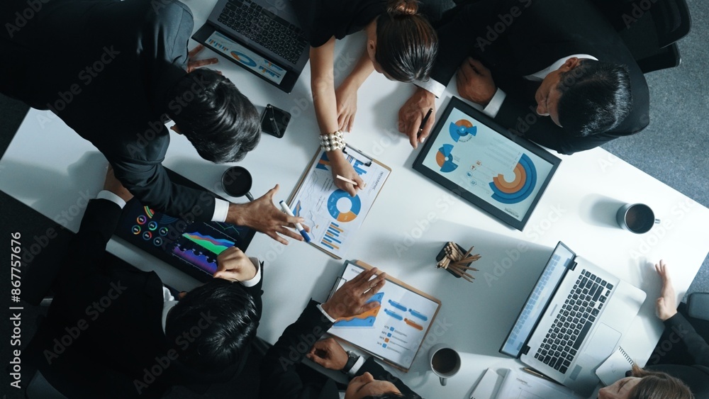 Aufkleber top down aerial view of business people discussing about financial strategy on table with document a
