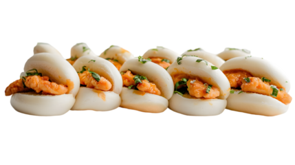  Chicken bao buns arranged neatly, showcasing their golden, tender chicken filling on a transparent background