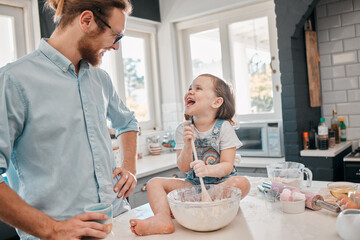 Dad, child and happiness in kitchen for baking, teaching and learning with bowl, flour or spoon....