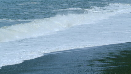 Storm Wave In Sea. Dark Sea Ocean Surface. Splashes Of Water From Waves Breaking. Slow motion.