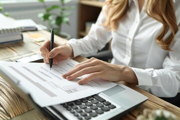 Full body photo of female Caucasian digital artist creating a customized electronic invoice template at her home office