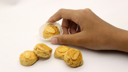 Peanut cake topped with cashew nuts,