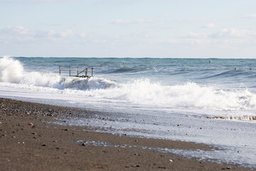 Stormy lwaves on the beach of Sochi, Russia, Black Sea