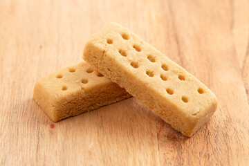 Classic Rectangular Butter Shortbread on a Wooden Kitchen Table