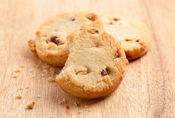 Sweet Round Pecan Butter Shortbread Cookies on a Wooden Table