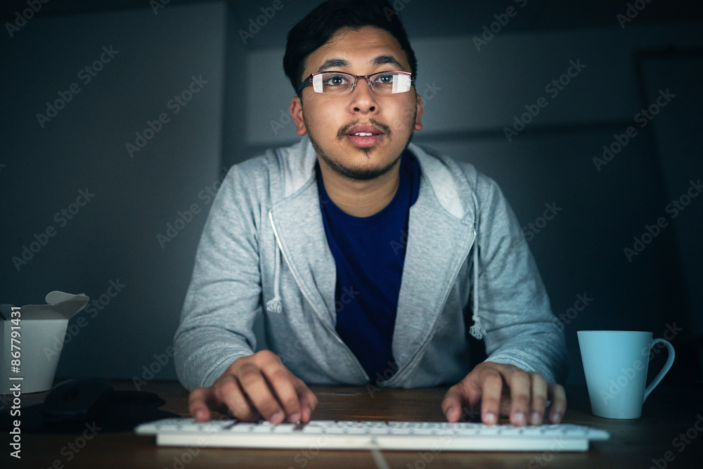 Poster Man, computer and keyboard at night in office of data coding, problem solving or software design as Developer. Male programmer, pc and typing for update, IT maintenance or working late for deadline