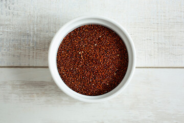 A top down view of a bowl of red quinoa.