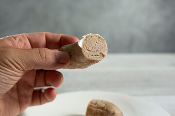 Fototapeta premium A view of the texture of a cooked sausage.