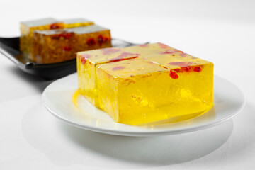 A view of osmanthus jelly with goji berries.