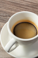 A view of a small mug of espresso.