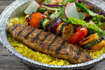 A view of a kofta kebab entree.